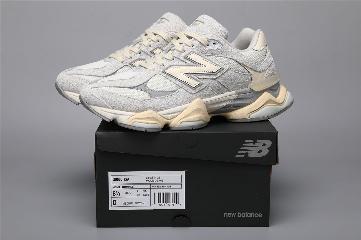 Baskets unisexes New Balance 9060 grises et blanches