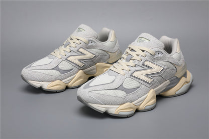 Baskets unisexes New Balance 9060 grises et blanches